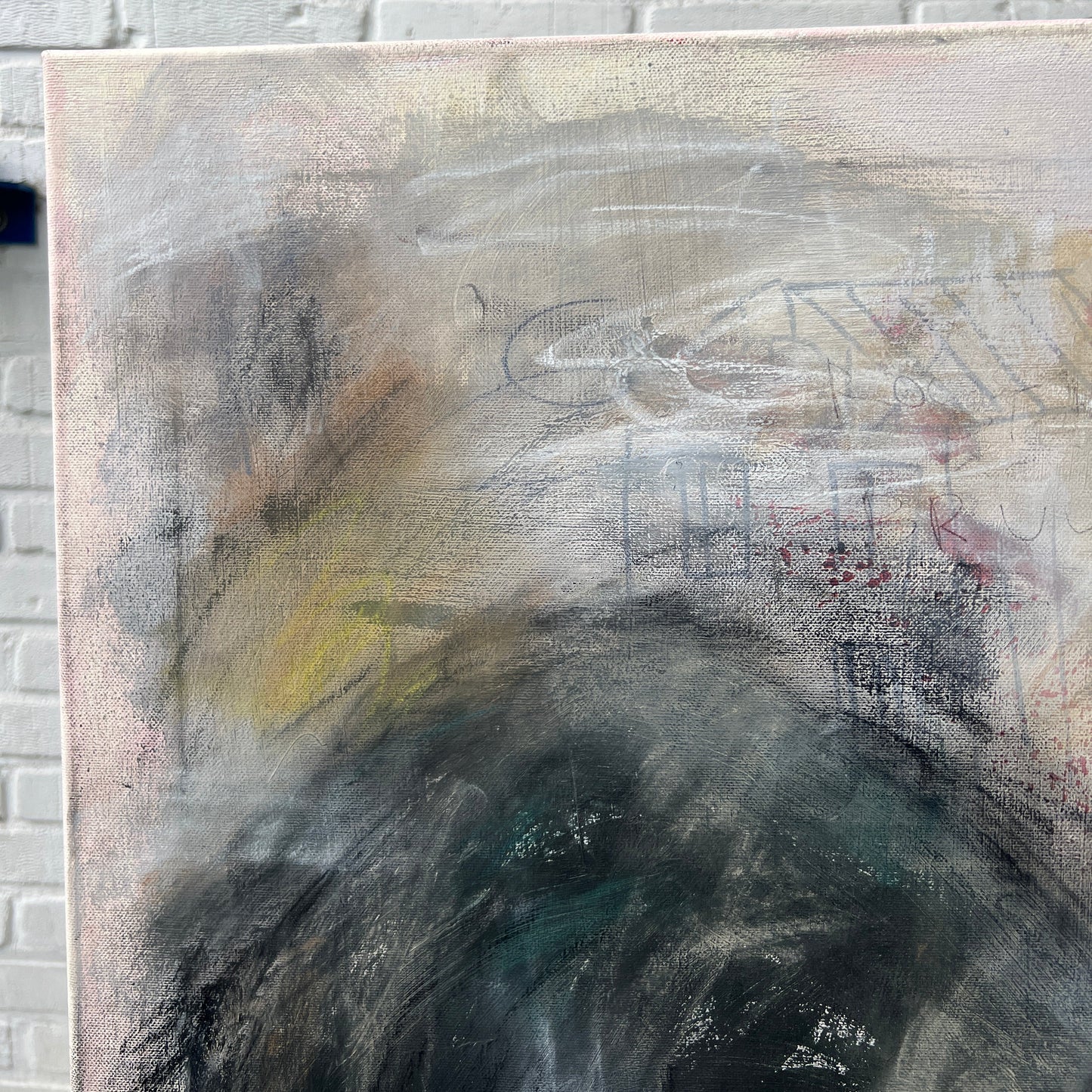 Abstract art piece on a textured surface
