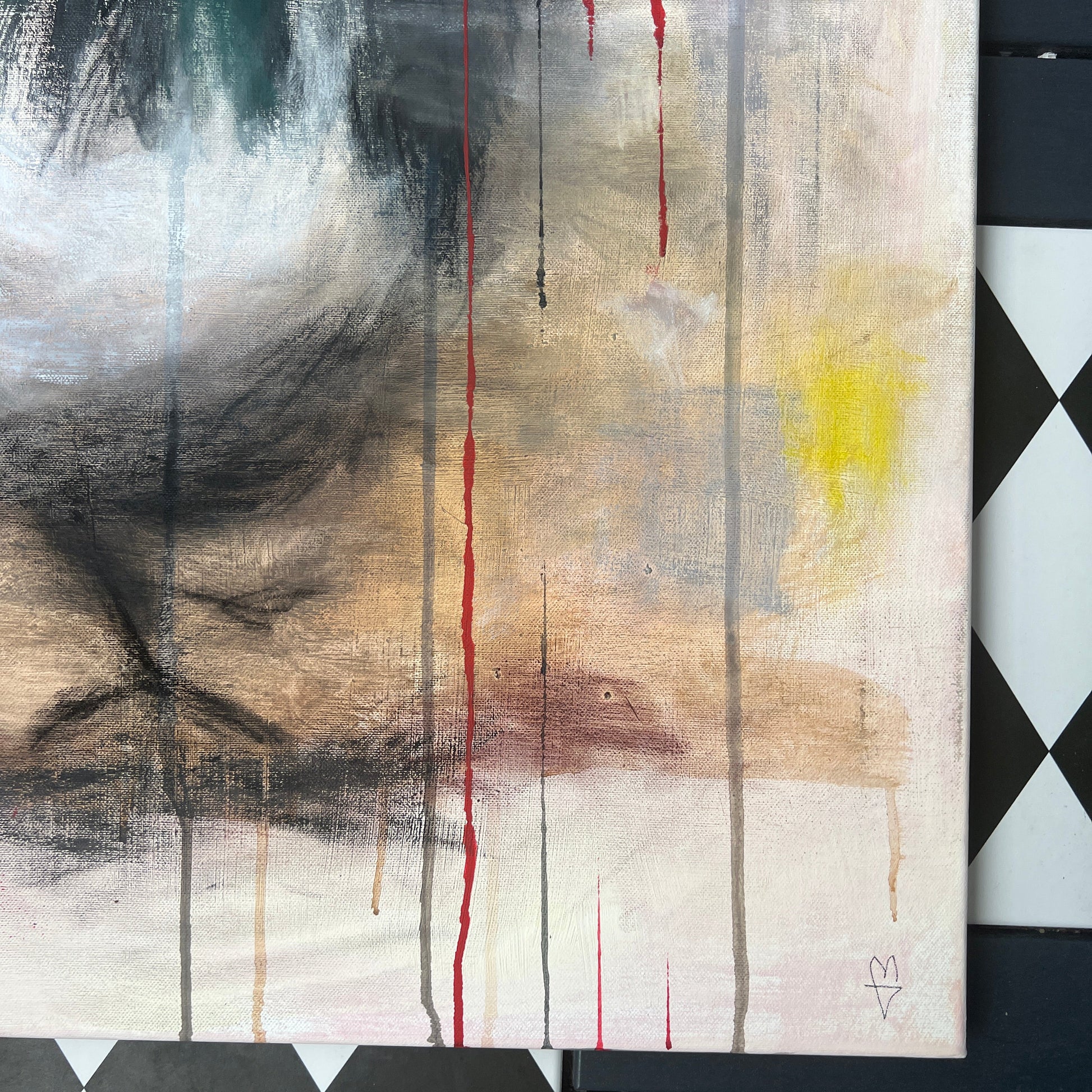 Abstract painting on a checkered floor