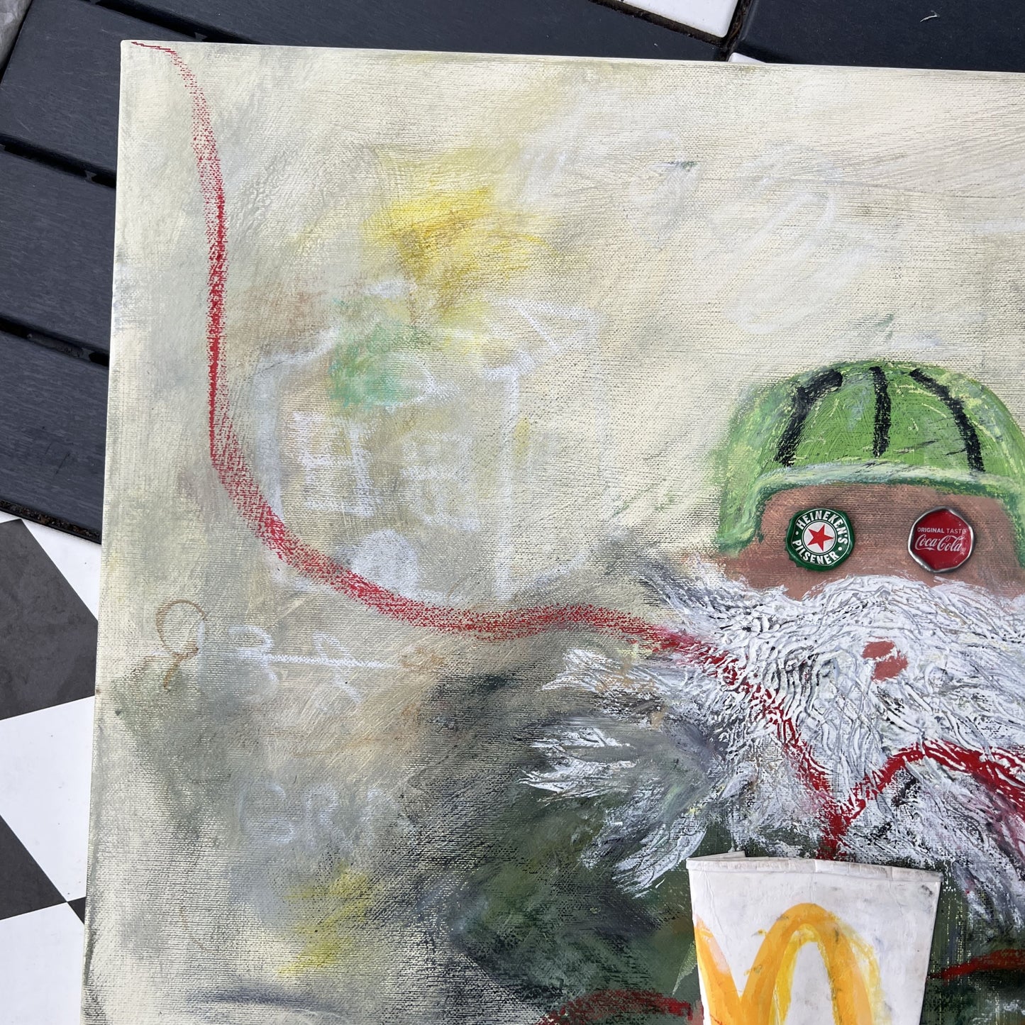 Artistic depiction of a bearded figure with a green hat and a cup, on a textured surface.