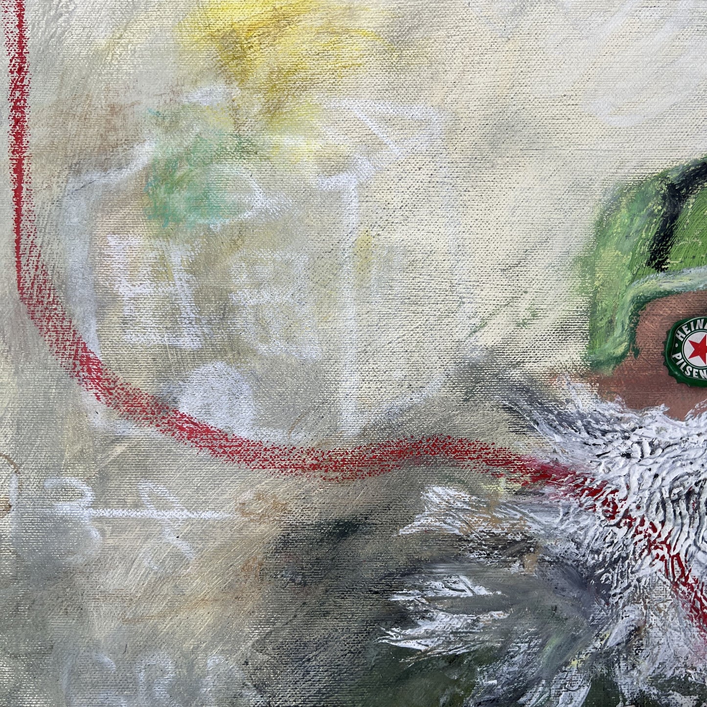 Abstract art with a red line and green label on a textured surface